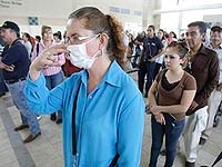 WHO raises global alert level on swine flu