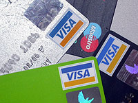 Credit card defaults rise to record levels