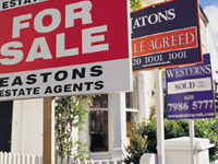 Home prices slide almost 20 percent