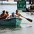 Members of a rescue team help evacuate people trapped in their flooded homes in New Orleans, La. - Reuters photo