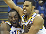 UCLA's Josh Shipp, right, celebrates with teammate Luc Richard Mbah a Moute of Cameroon, after making a last-second shot to defeat California.(AP Photo/Chris Pizzello)